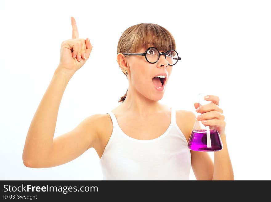 Beautiful young scientist holds up a flask while showing a flash of inspiration. Horizontal shot. Beautiful young scientist holds up a flask while showing a flash of inspiration. Horizontal shot.