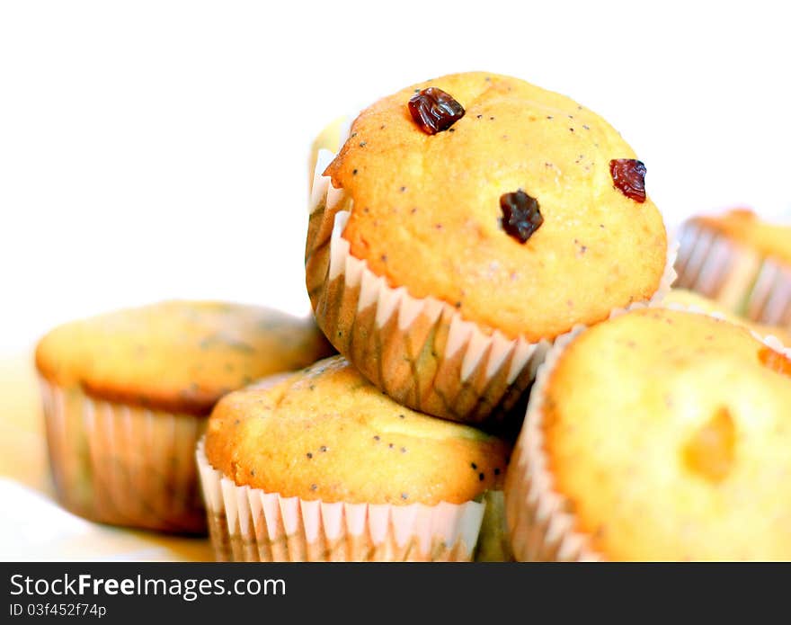 A group of muffins isolated on white background. A group of muffins isolated on white background