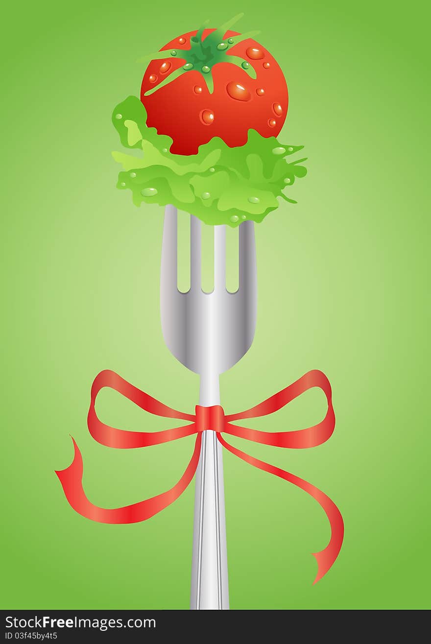 Fresh red tomato and salad on a fork