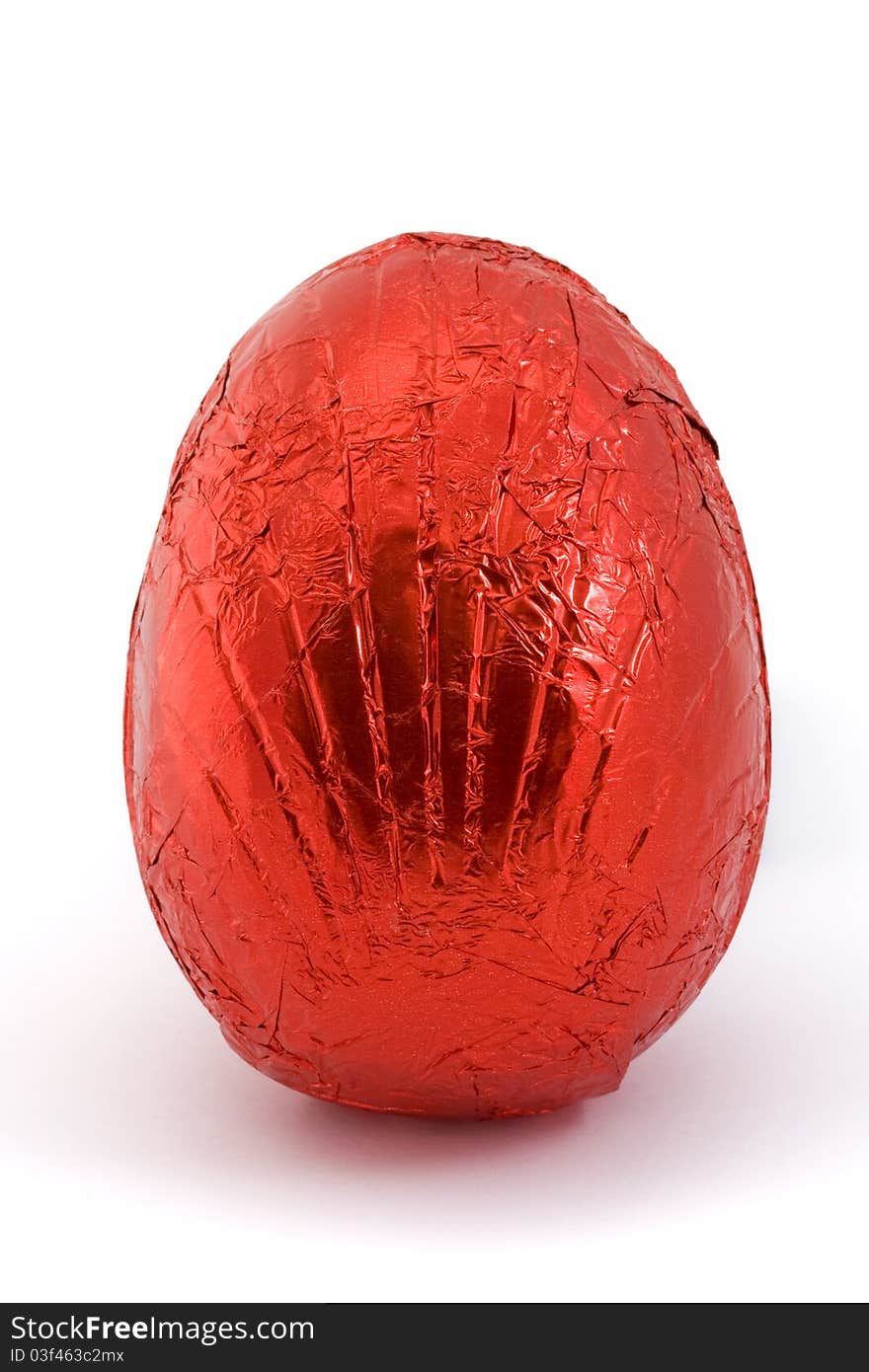 Red easter egg isolated on a white background. Red easter egg isolated on a white background