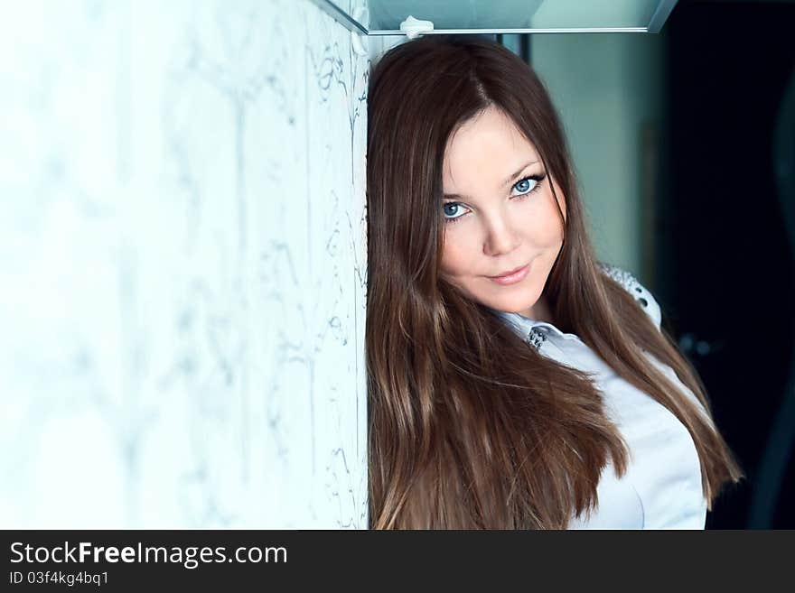 Portrait of attractive young woman indoors. Portrait of attractive young woman indoors