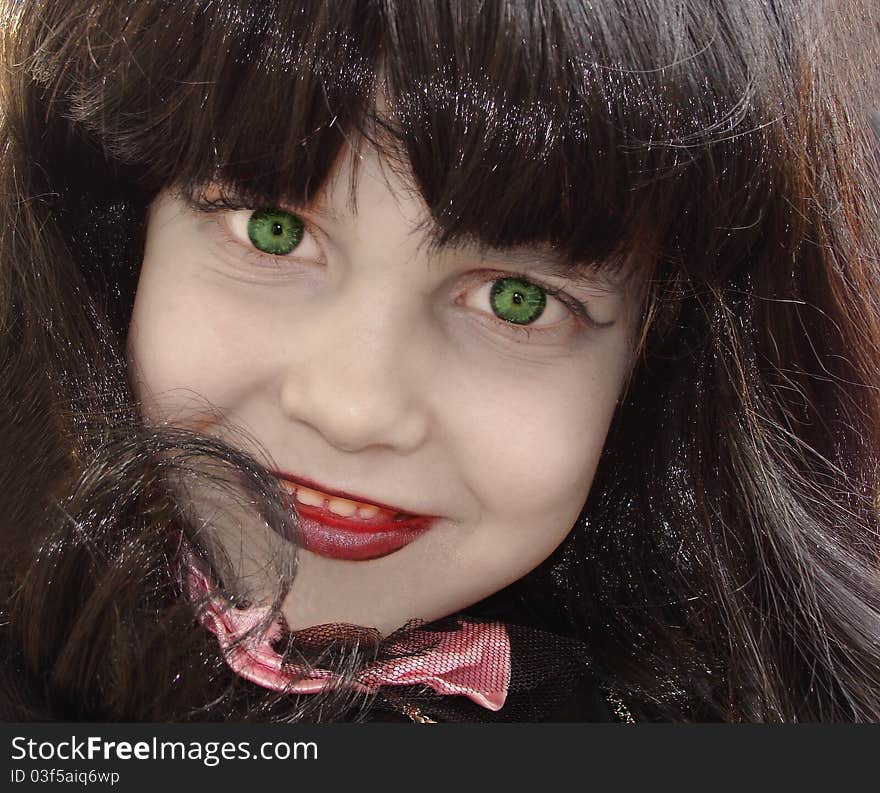 Portrait in the foreground a young girl makeup. Portrait in the foreground a young girl makeup