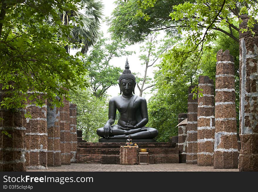 Bronze Buddha locates in the park at Ratchaburi, Thailand. Bronze Buddha locates in the park at Ratchaburi, Thailand.