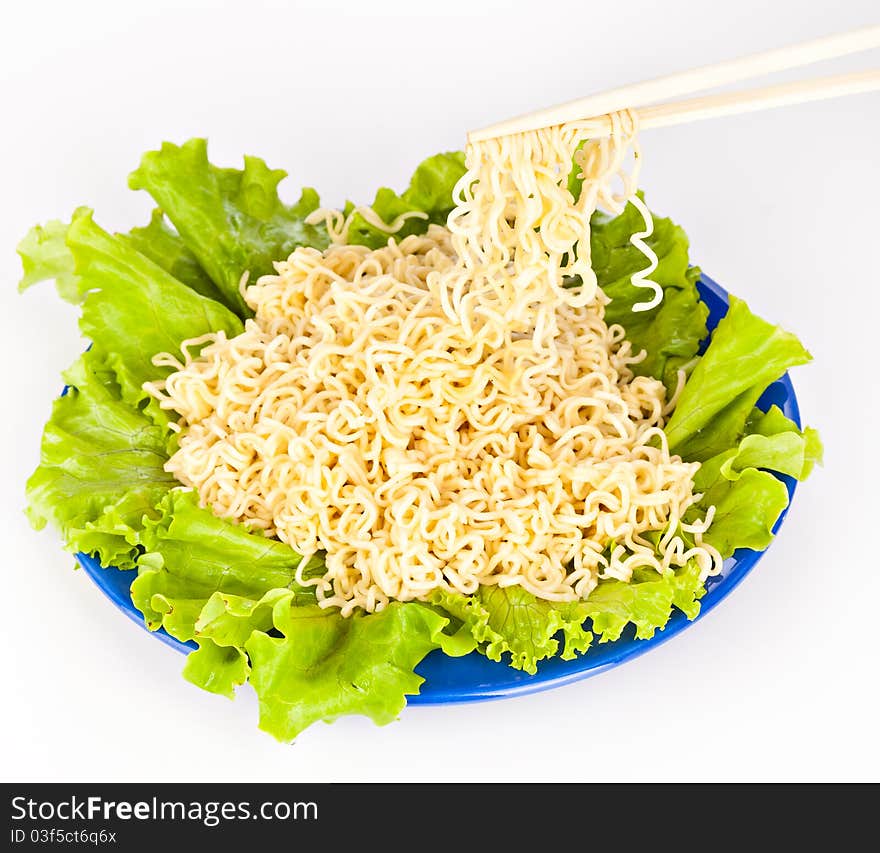 Vermicelli and lettuce. Isolated on a white bachground