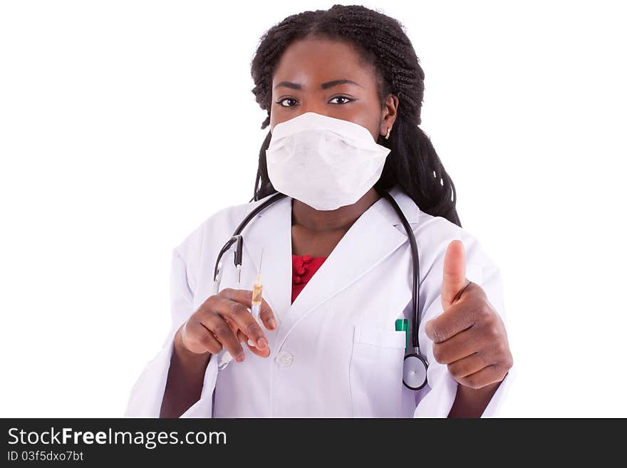 A young black woman doctor with an injection in her hand. A young black woman doctor with an injection in her hand