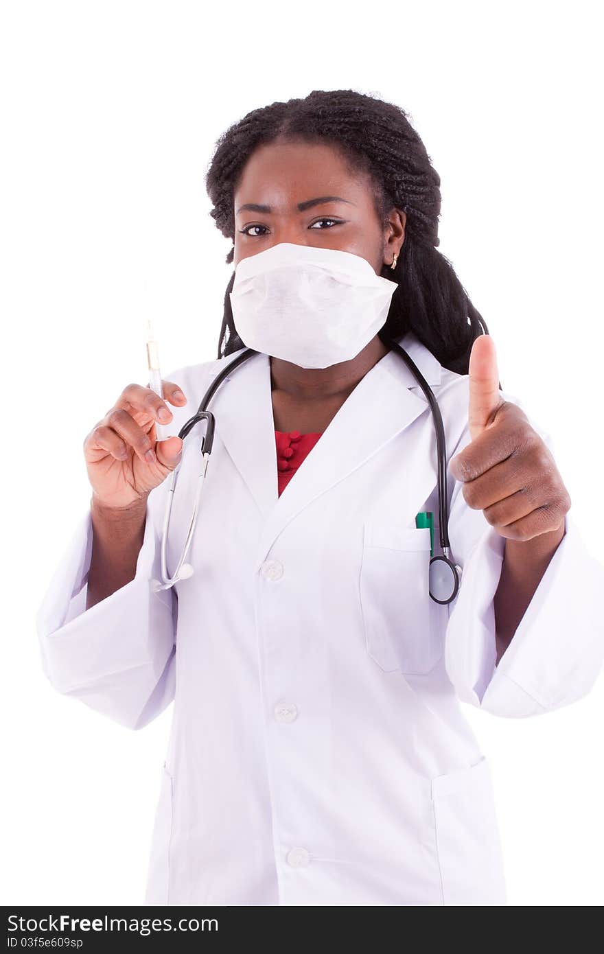 A young black woman doctor with an injection in her hand. A young black woman doctor with an injection in her hand