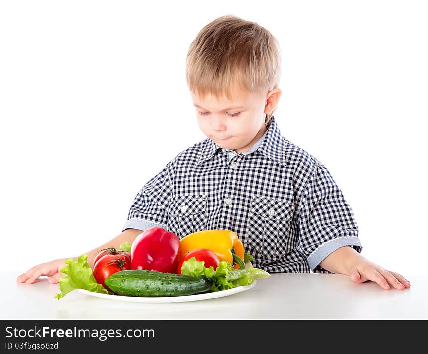 A Boy And The Plate Of Vegetables