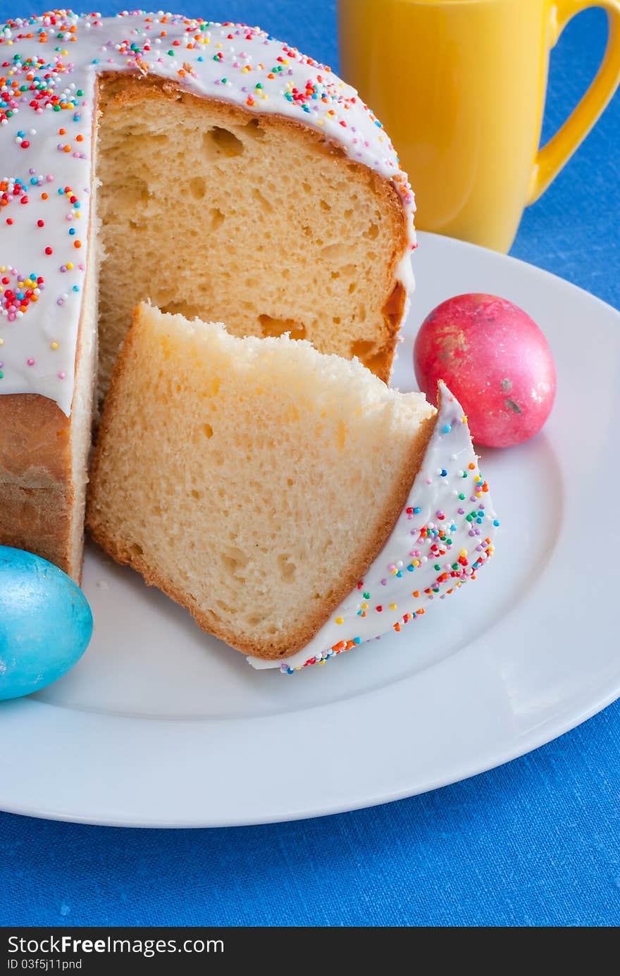 Easter cake on white plate end eggs. Easter cake on white plate end eggs.