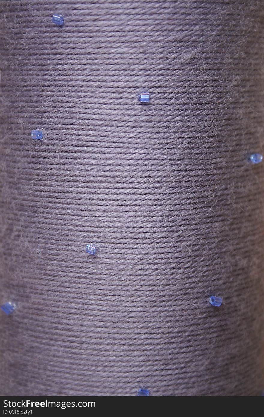 Round texture of grey woolen threads beads