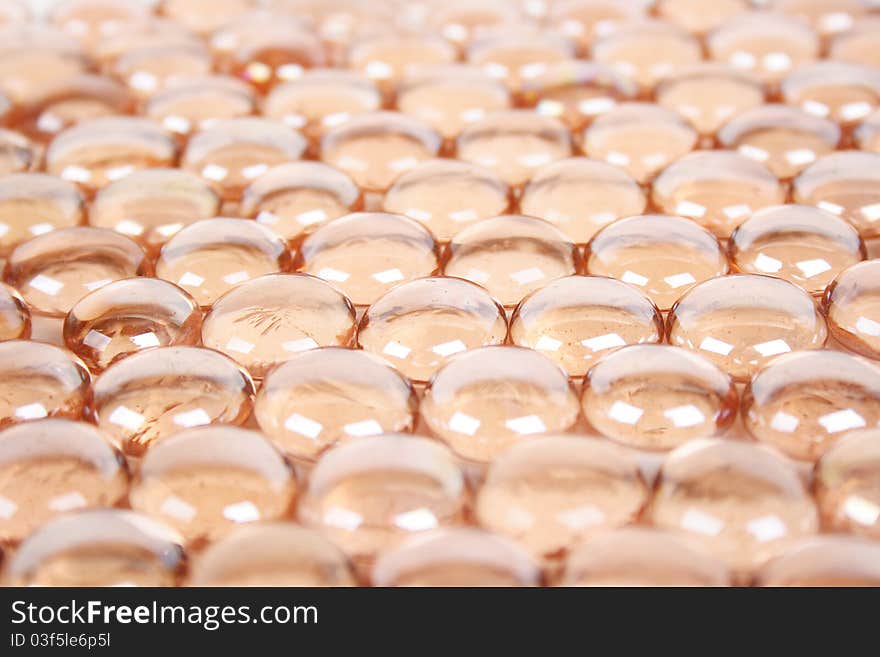 Background With Many Orange Glass Balls