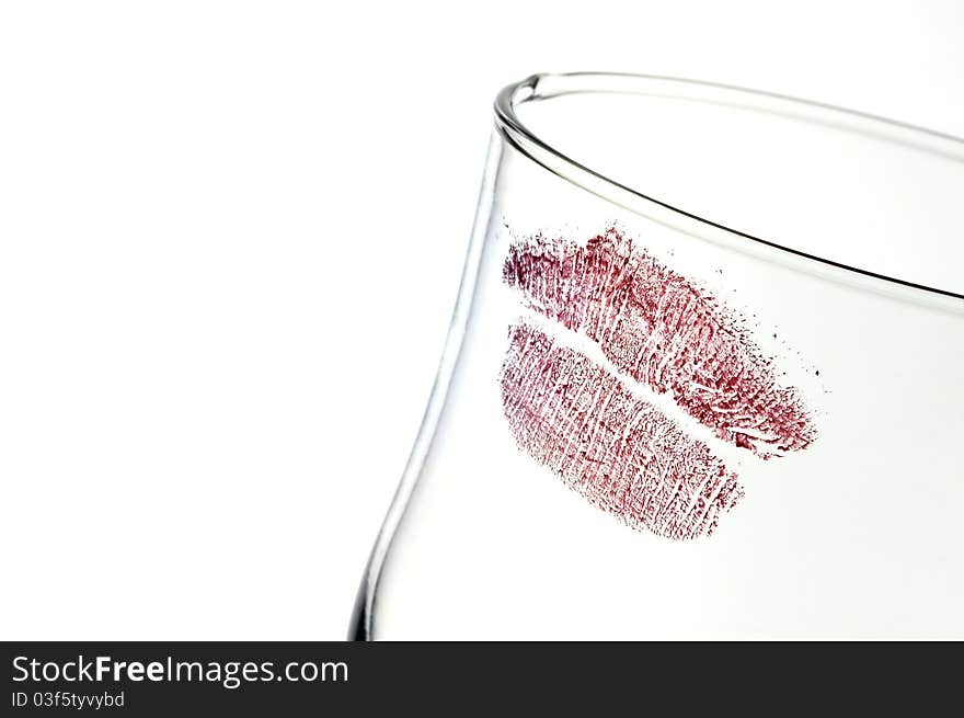 Kiss on glass on thumped background.