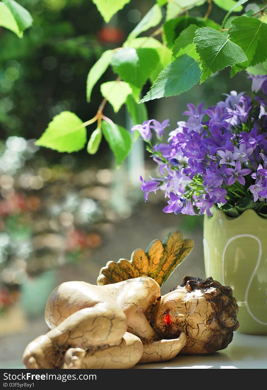 Sleeping angle under lavender flower and birch branch. Sleeping angle under lavender flower and birch branch