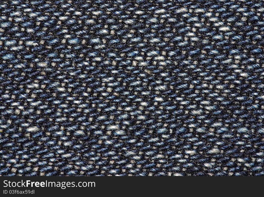 Macro of dark blue jeans fabric. Macro of dark blue jeans fabric