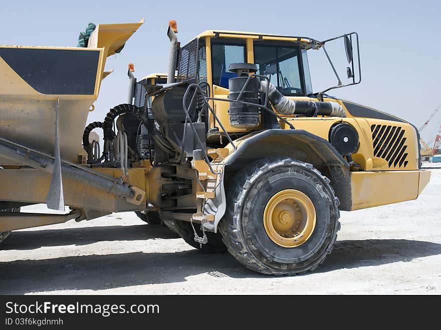 Heavy duty tipper on a construction site. Heavy duty tipper on a construction site