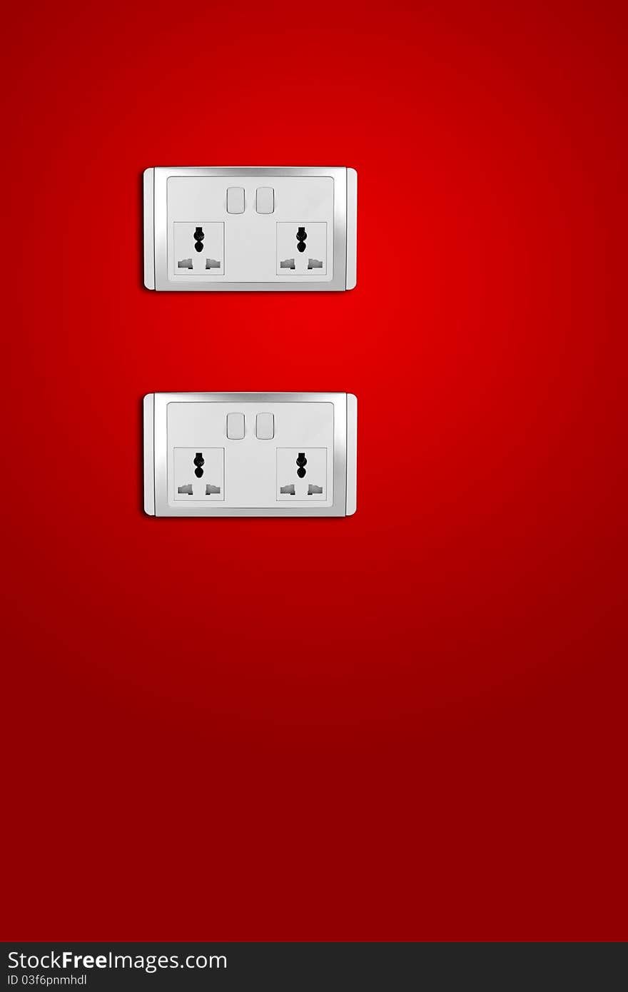 Electric consumption - electric outlet on red wall