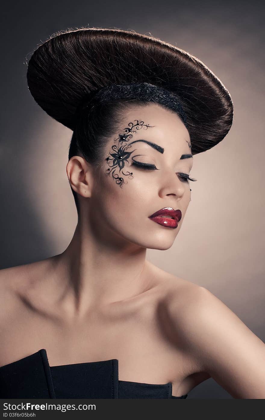 Portrait of beautiful girl with coiffure disc on grey. Portrait of beautiful girl with coiffure disc on grey