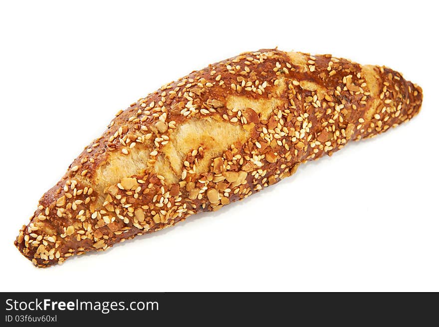 Croissant with seeds isolated