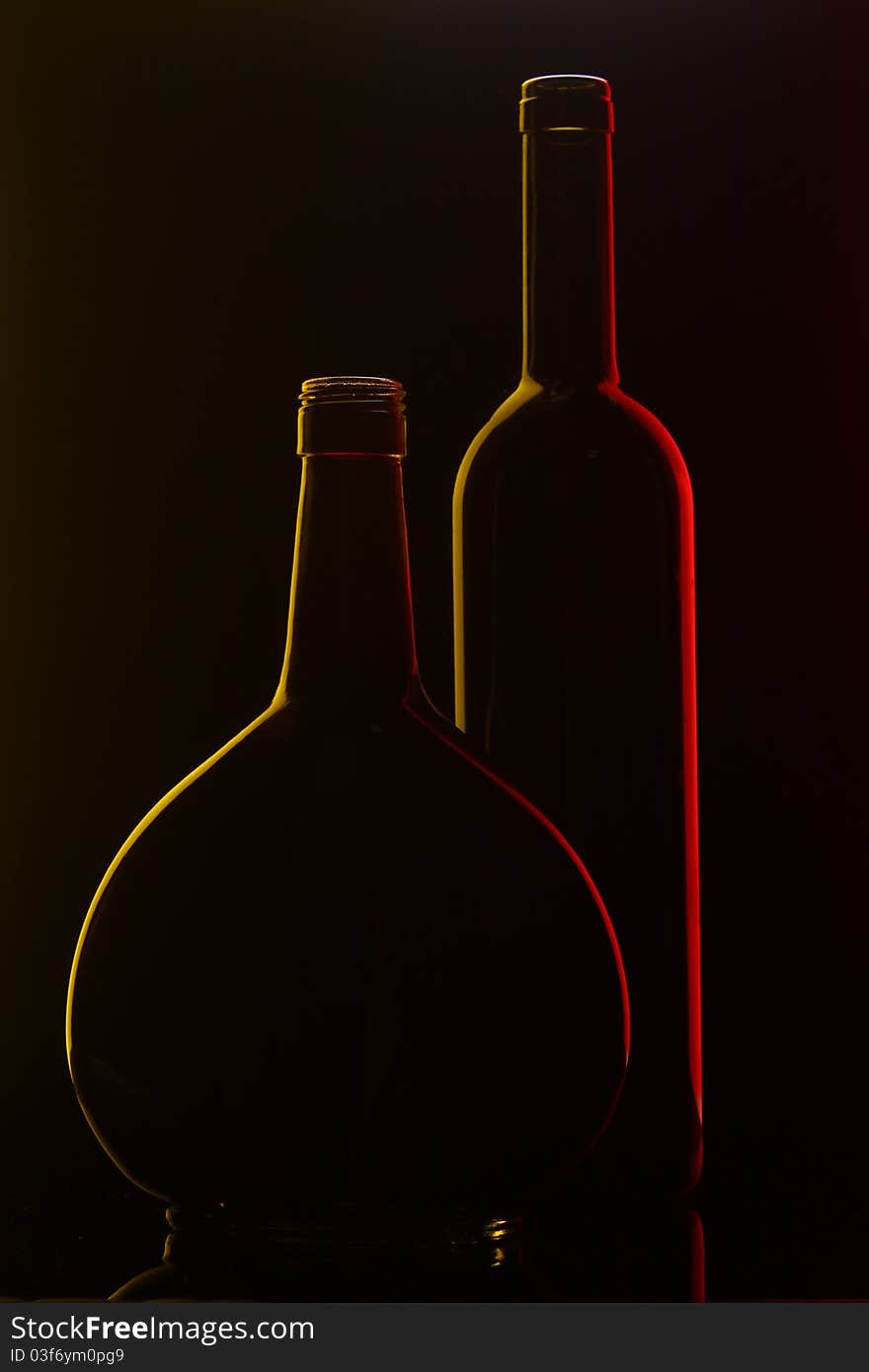 Two glass bottles on dark background. Hight quality 3d render