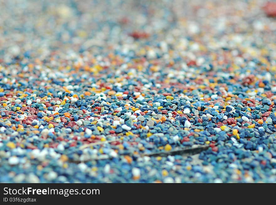 Small colorful pebble on a beach