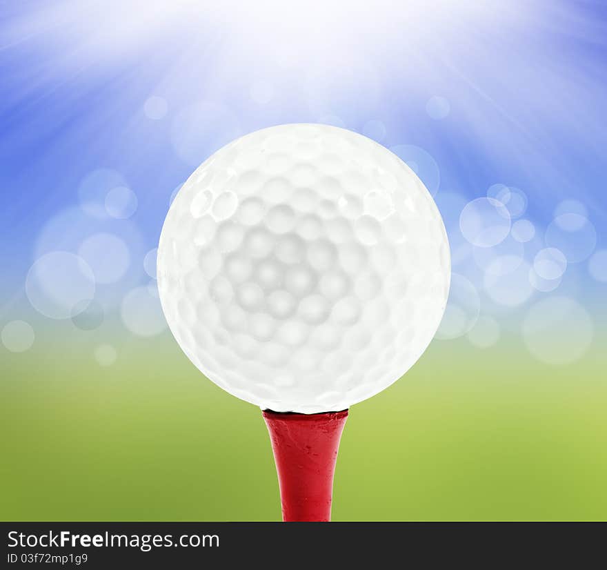 Spring background with a golf ball on a peg