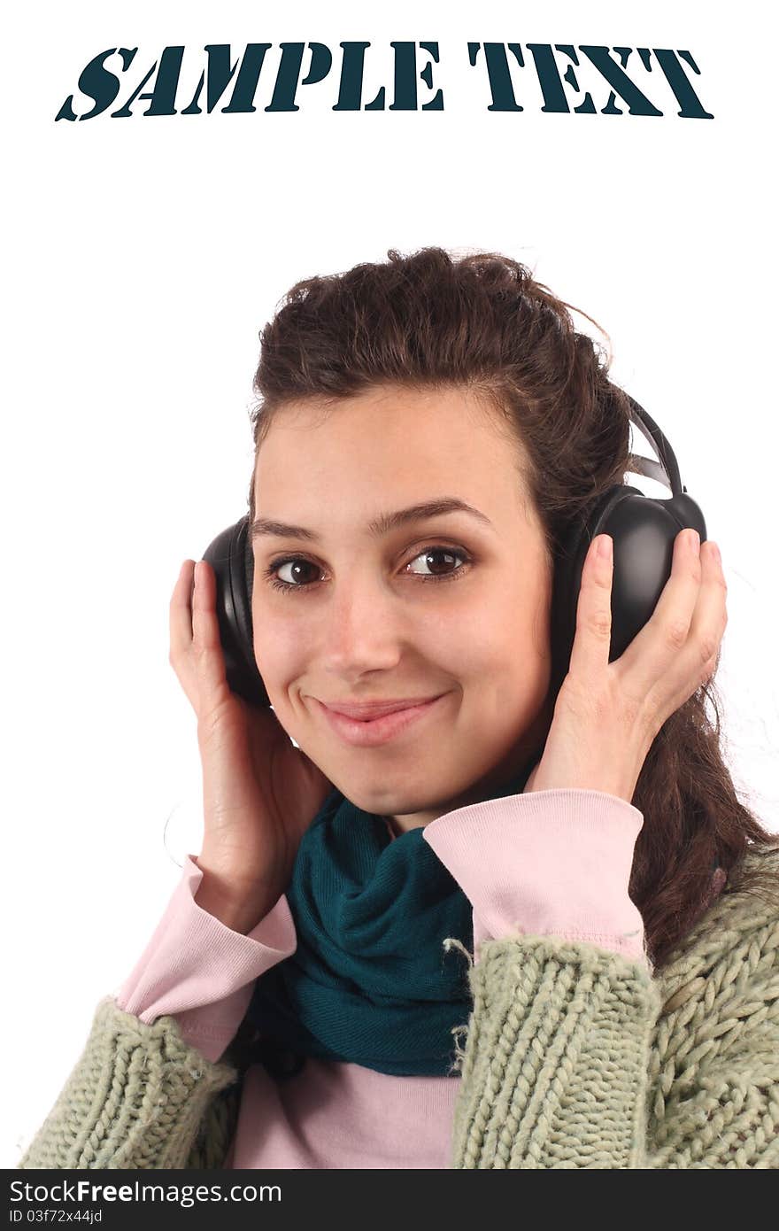 Young girl listen music on white