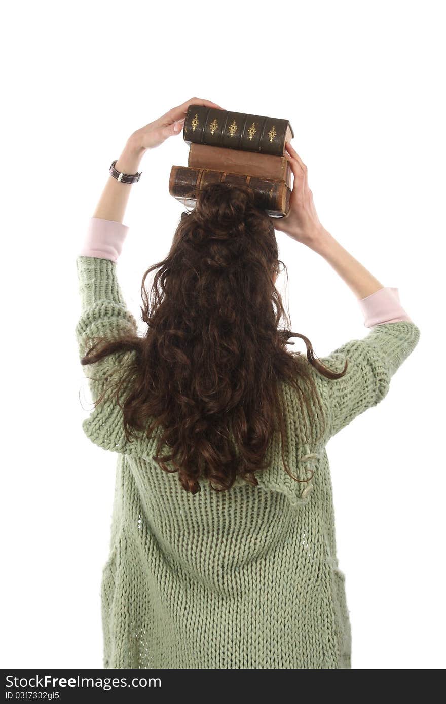 Girl with books on a head. Girl with books on a head