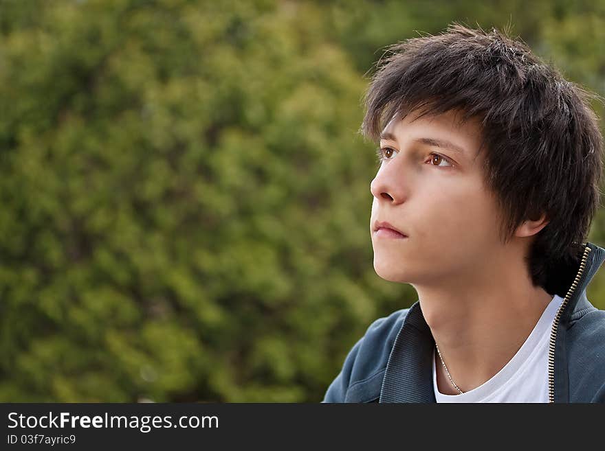 Outdoors portrait of atractive young man