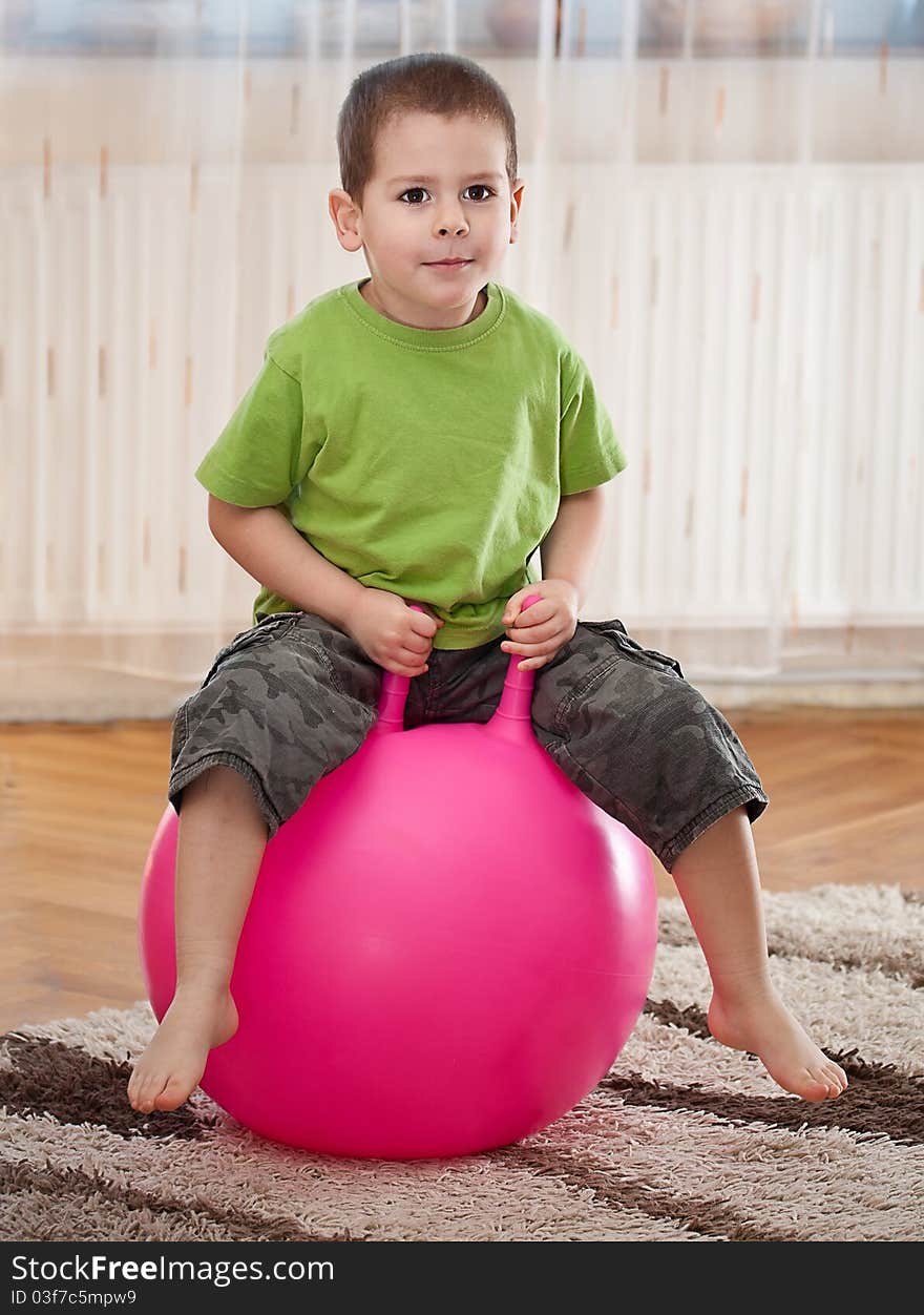 Boy with large ball