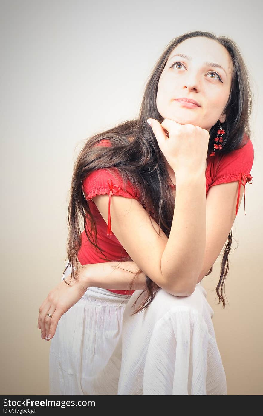 Portrait of a beautiful girl with long hair