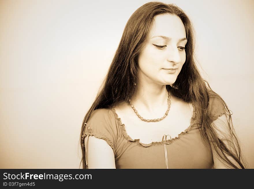 Portrait of a beautiful girl with long hair