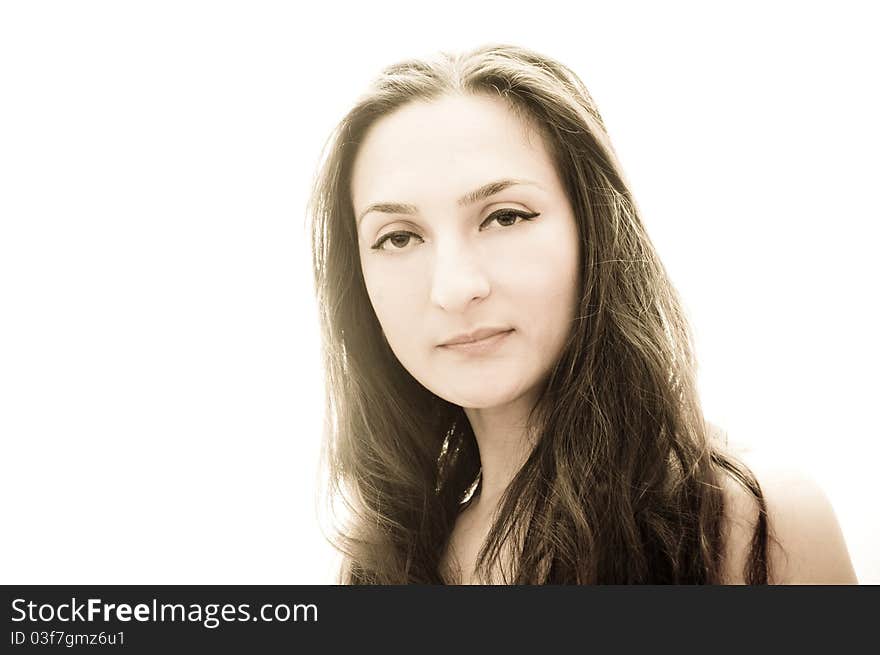 Portrait of a beautiful girl with long hair