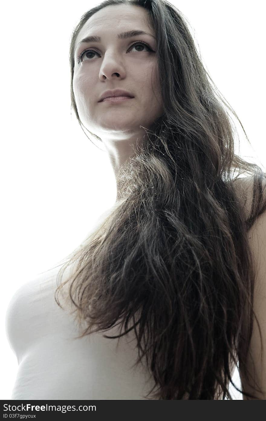 Portrait of a beautiful girl with long hair
