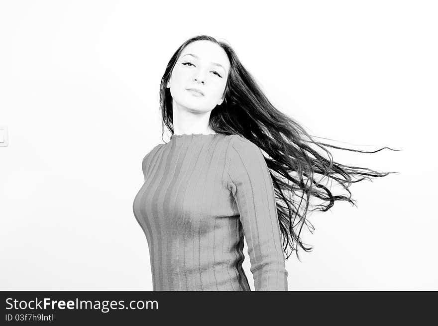 Portrait of a beautiful girl with long hair