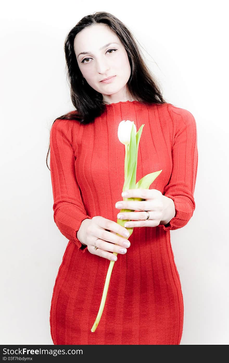 Portrait of a beautiful Girl offering you a Flower. Portrait of a beautiful Girl offering you a Flower