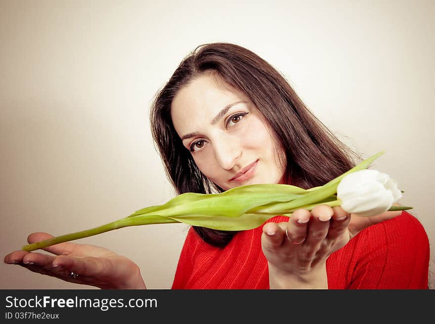 Portrait of a beautiful Girl offering you a Flower. Portrait of a beautiful Girl offering you a Flower