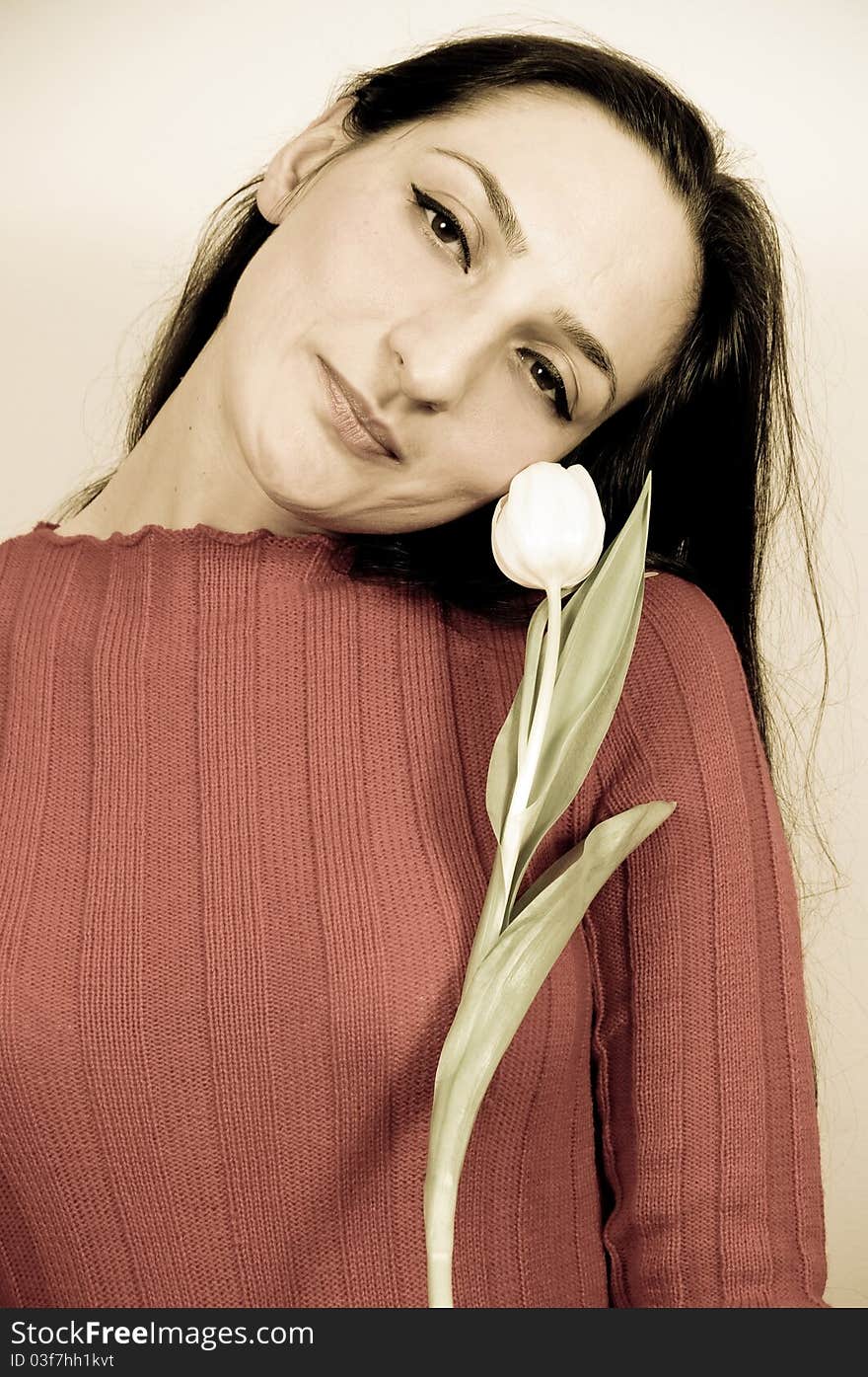 Portrait of a beautiful Girl With a Flower