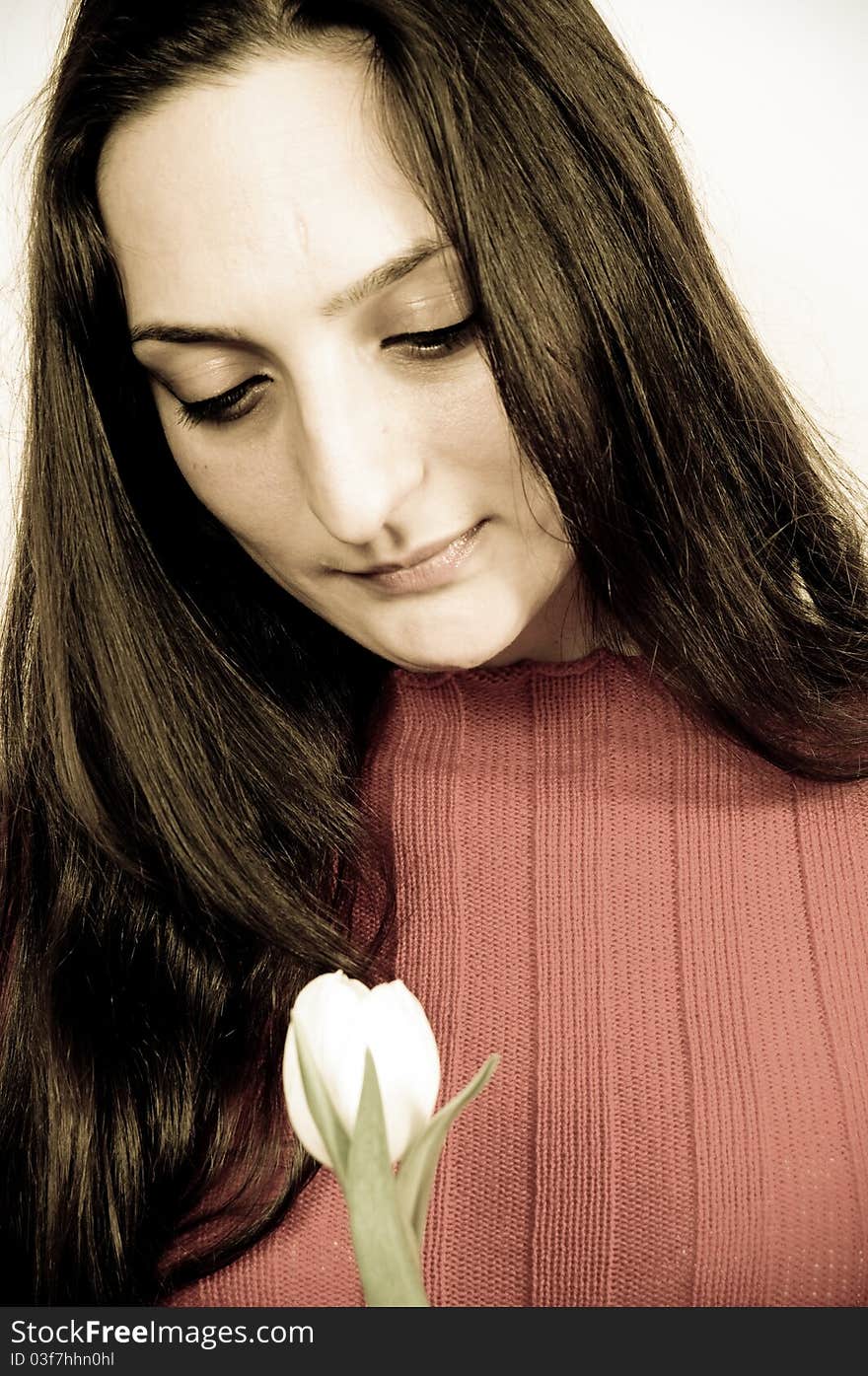 Portrait of a beautiful Girl With a Flower