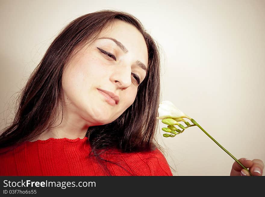 Portrait of a beautiful Girl With a Flower