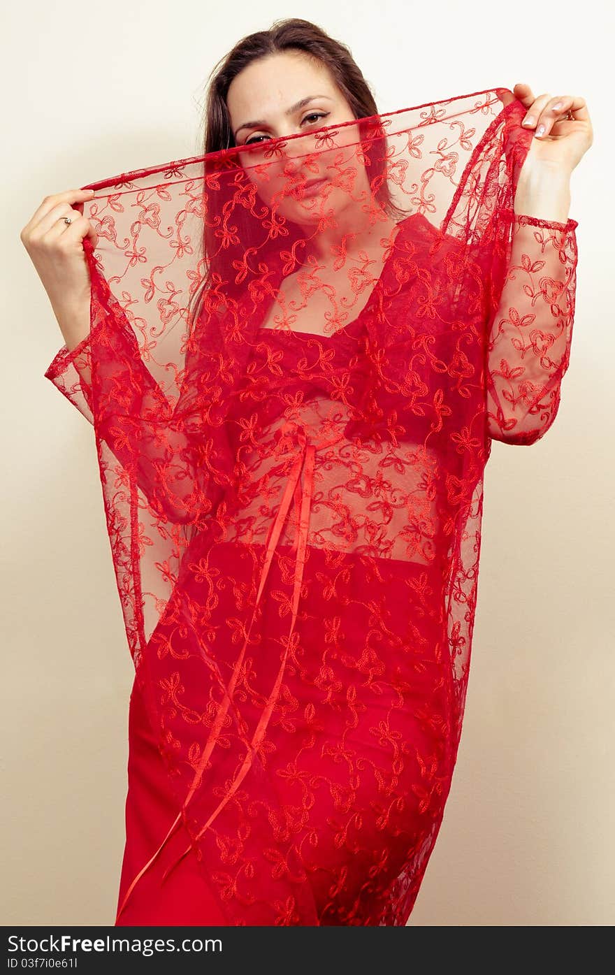 Portrait of a beautiful girl Dancing in a Red Dress