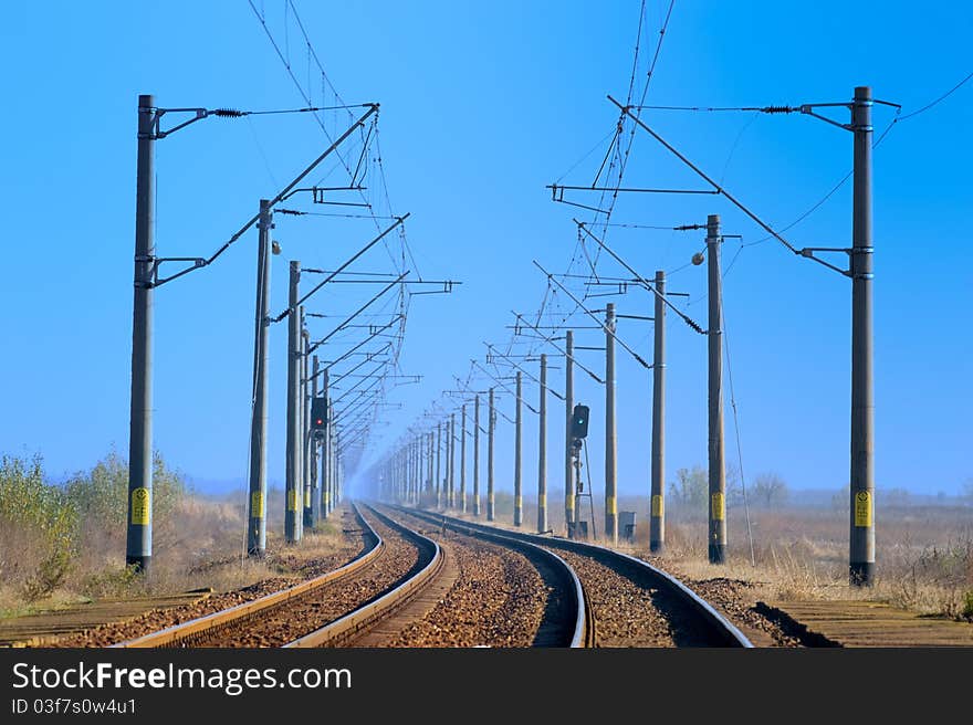 Railway tracks in a rural scene