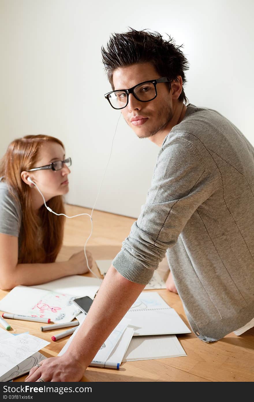 Beautiful young couple listening music. Beautiful young couple listening music.