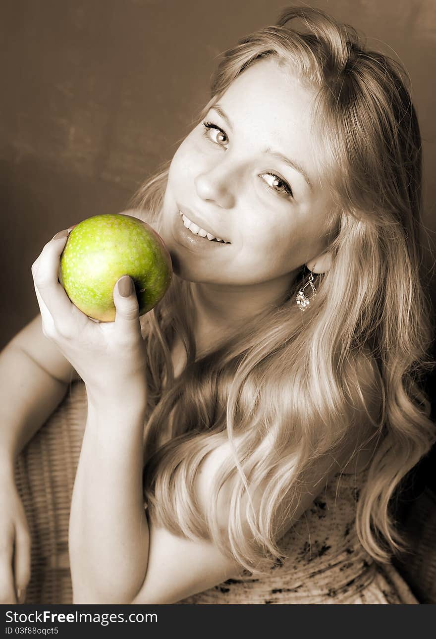 Young beautiful pretty girl with green apple. Young beautiful pretty girl with green apple