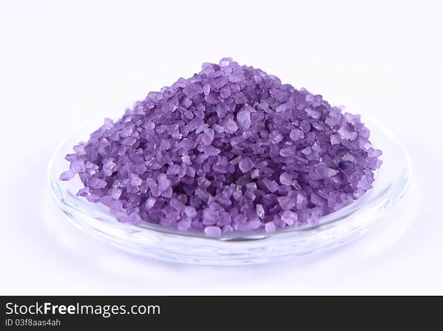 Lavender spa salt on a white background