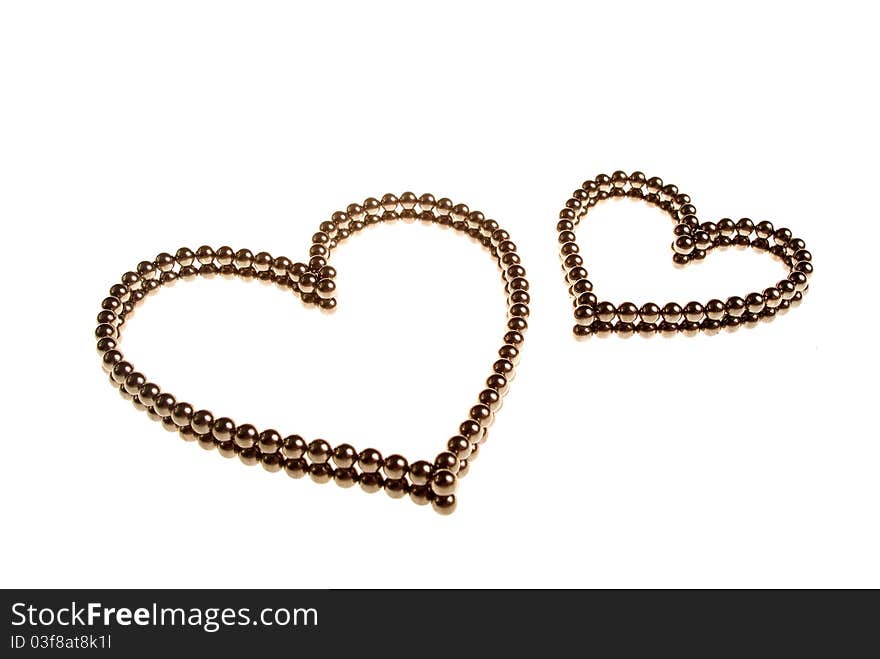 Two hearts of small metal beads