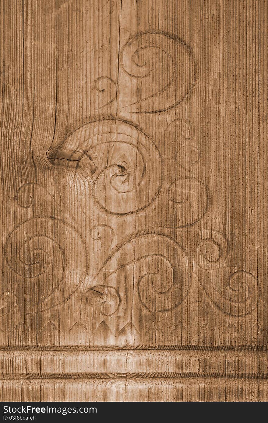 Carving on old wooden board