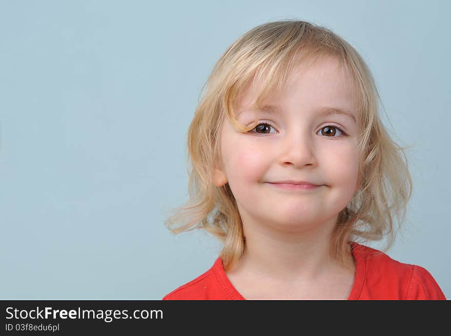 Portrait of lovely blond little girl