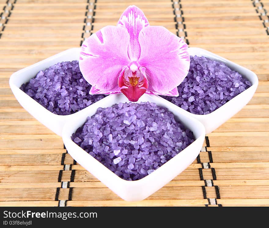 Lavender spa salt and an orchid flower