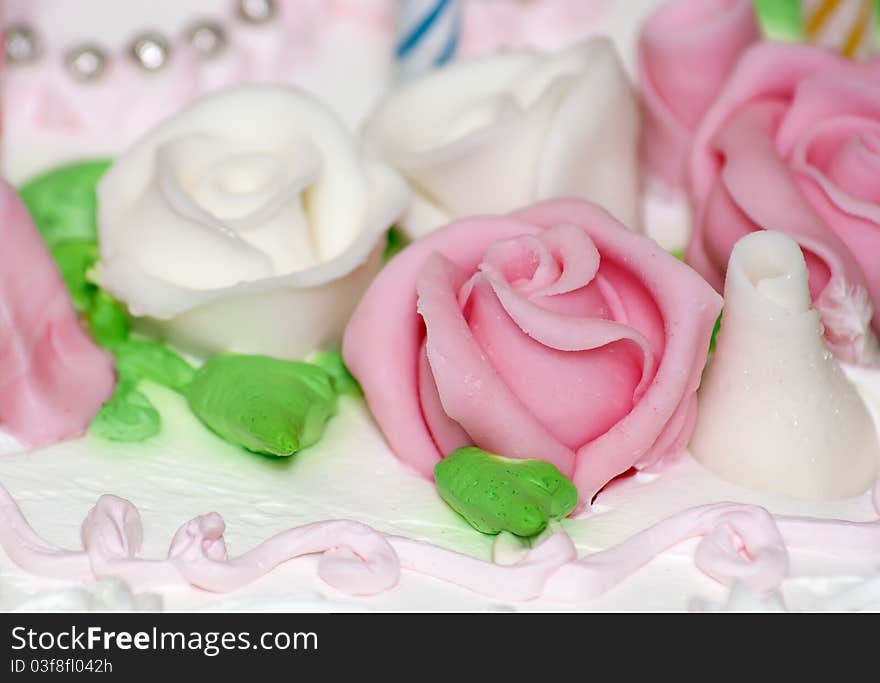 Sweet decorative whipped cream rose on torte. Sweet decorative whipped cream rose on torte