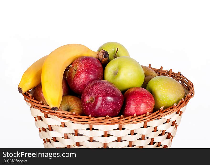 Basket with apples and bananas