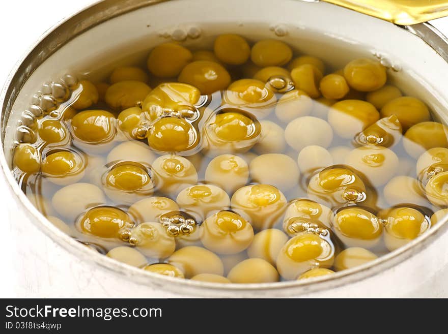 Delicious canned green peas in a tin